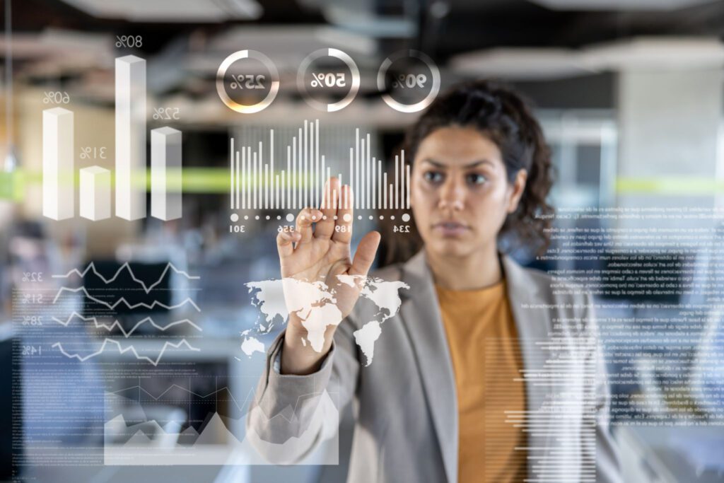 Woman interacting with digital data interface.